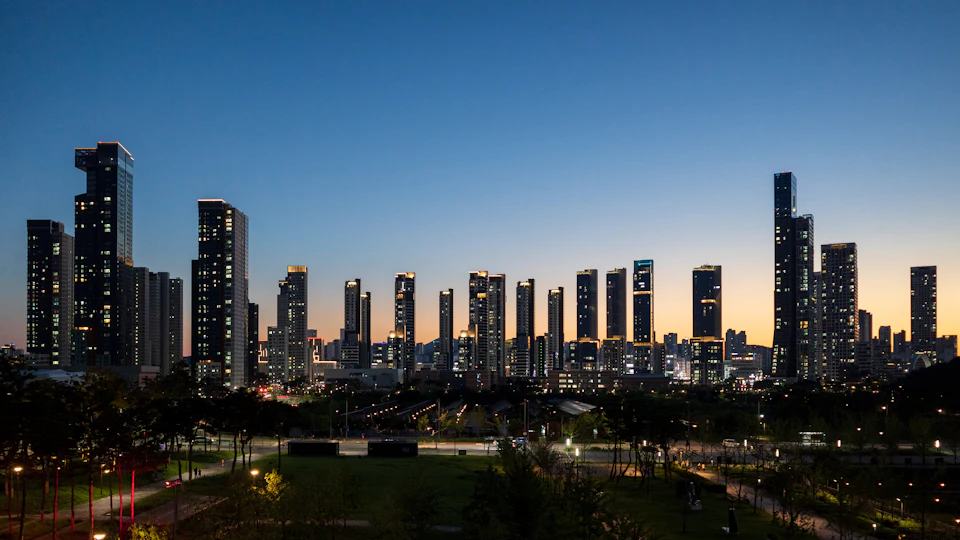 A modern city skyline at dusk